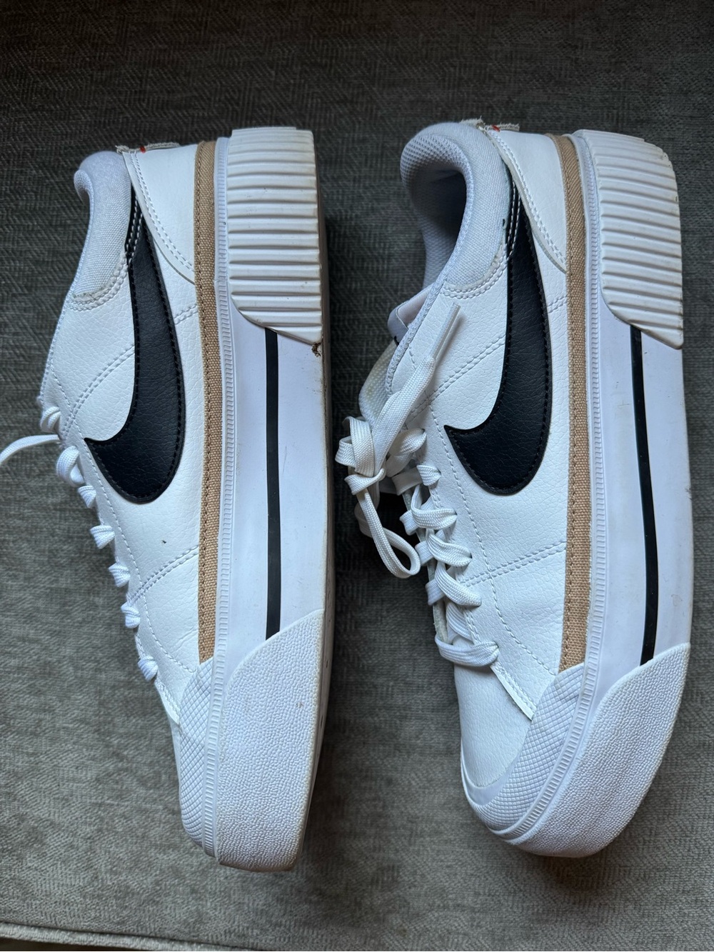 Nike White Sneakers with Black Logo